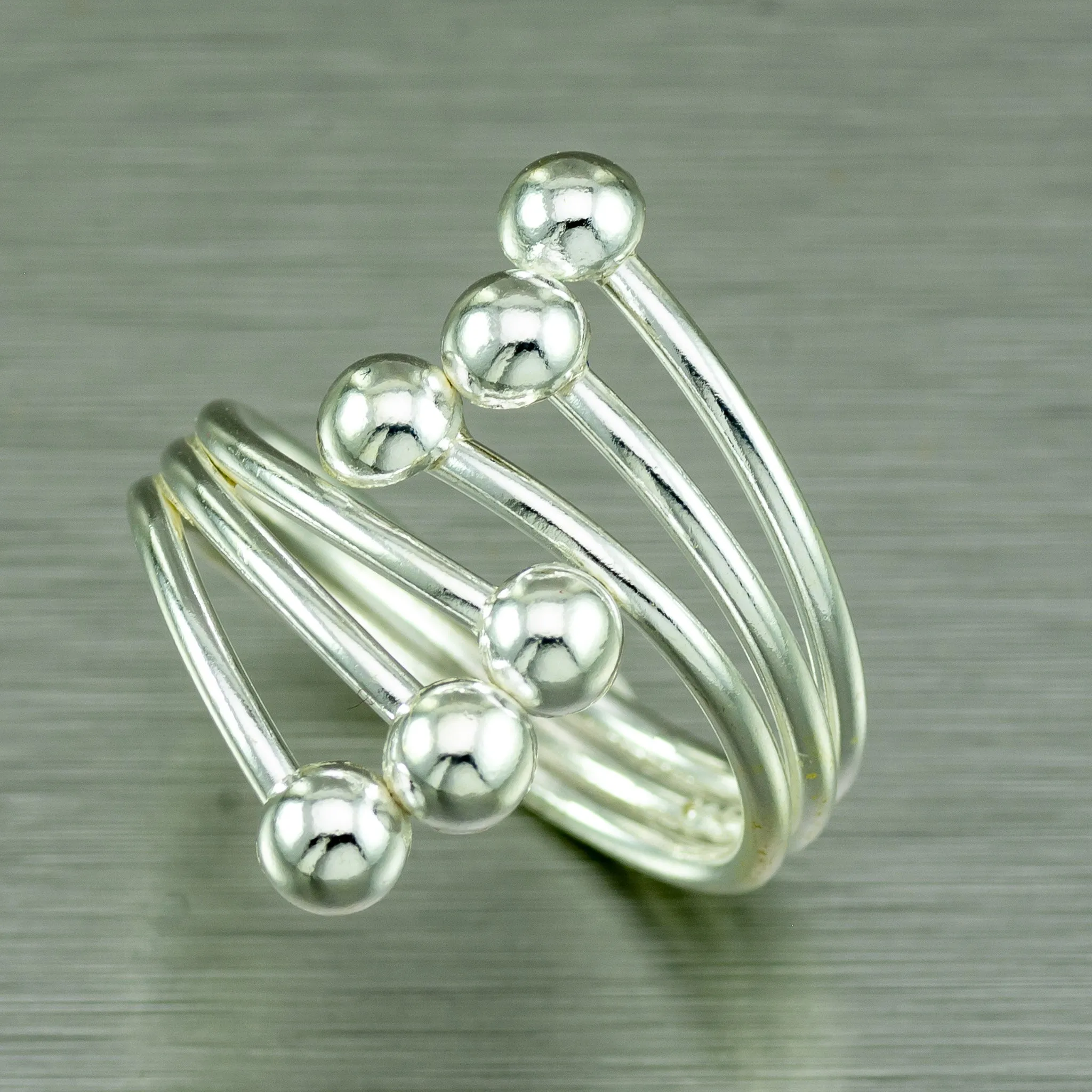 Modern, sterling silver multi ball ring